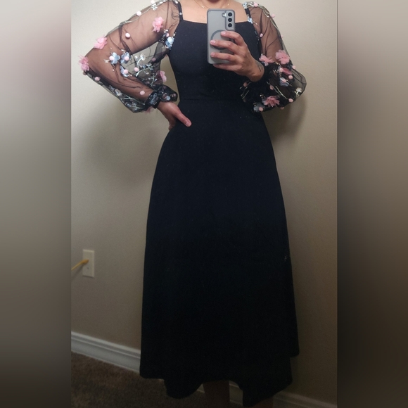 All black with cute Pom poms and flowers on the puffy sleeves. - Picture 1 of 5